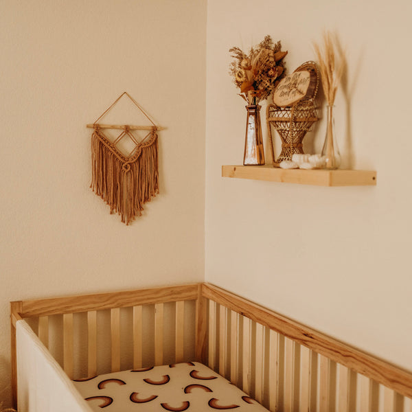 boho wall hanging in baby nursery