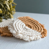 macrame tea coasters semicircle design, half of the coaster in natural white and half in golden sand